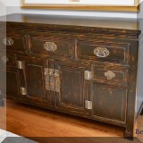 F16. Asian-inspired painted cabinet. 35”h x 56”w x 18”d 